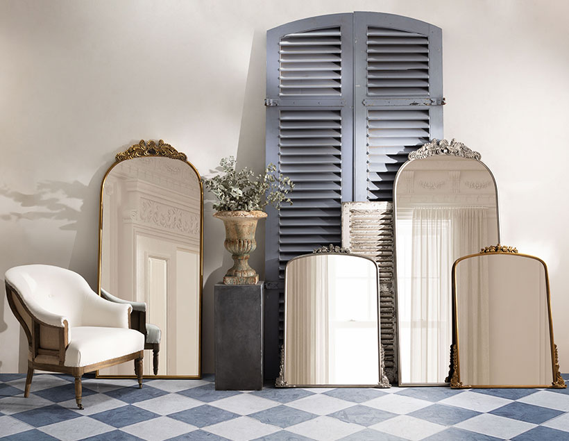 Ornate gilded mirrors in silver and gold