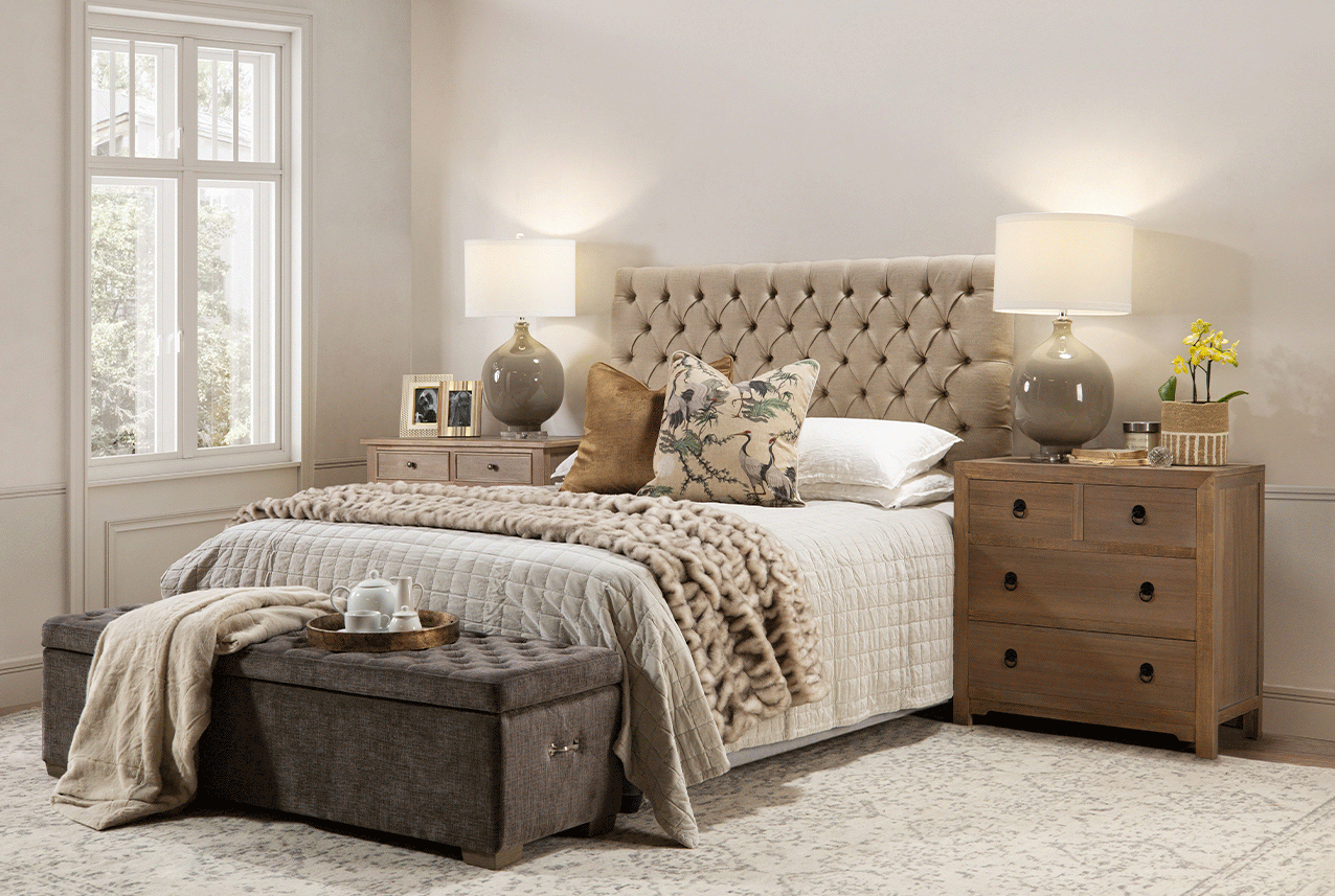 Luxurious neutral bedroom with faux fur and natural textures