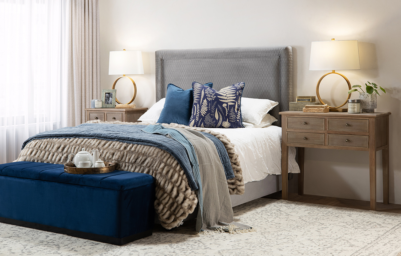 Blue and Grey Bedroom with faux fur and velvet