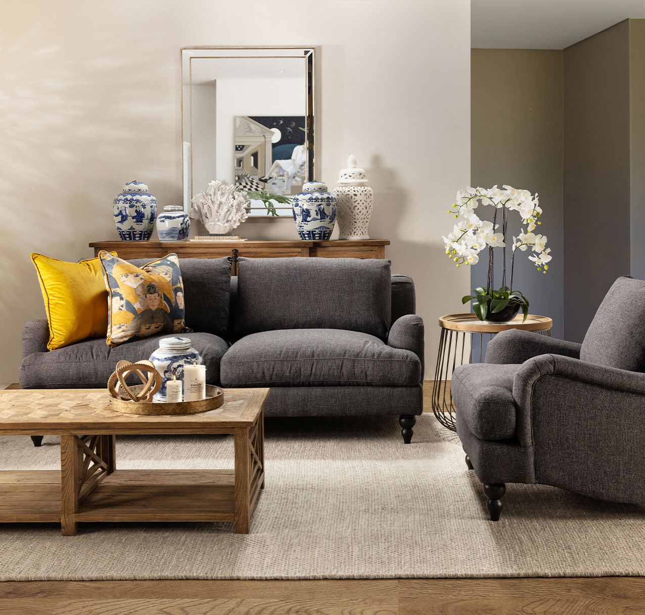 Cosy lounge look with charcoal rolled arm sofa 