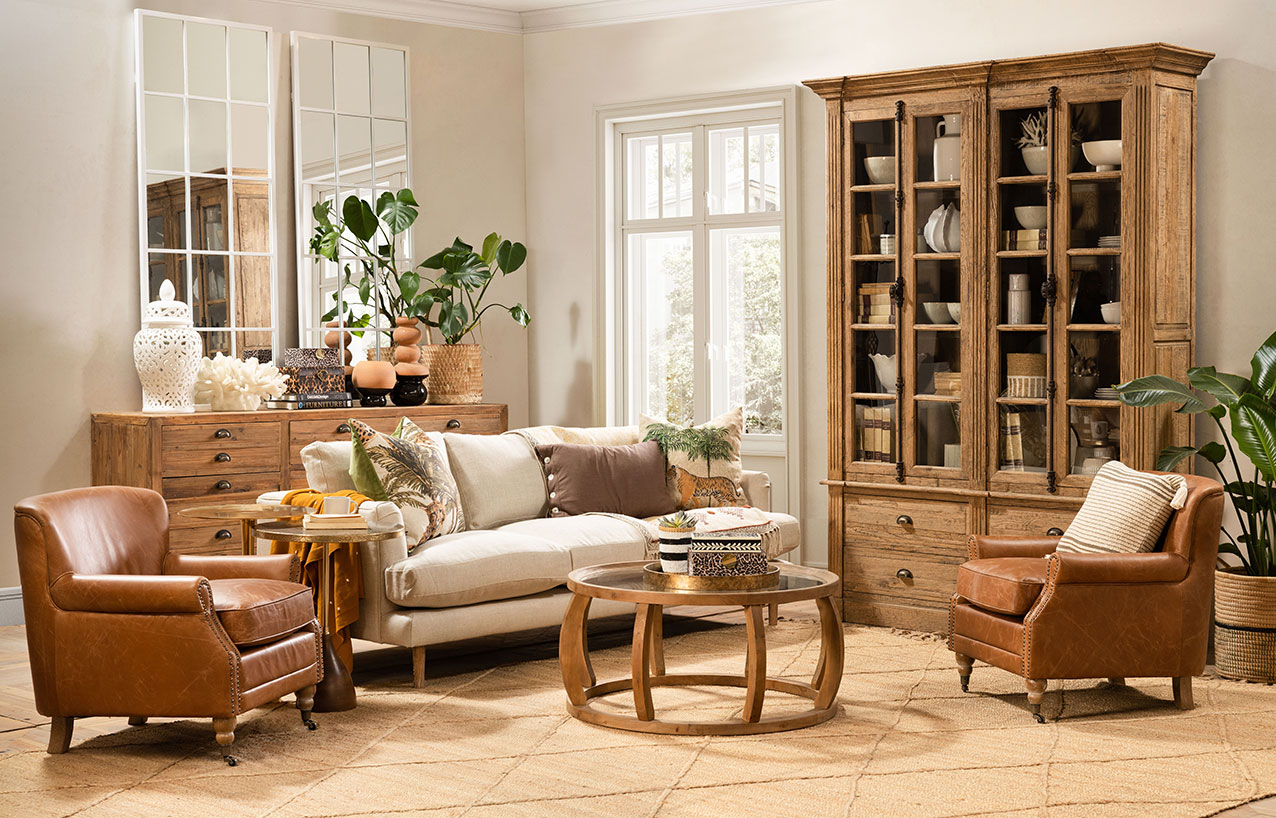Classic living room look with natural wood coffee table and cupboards 