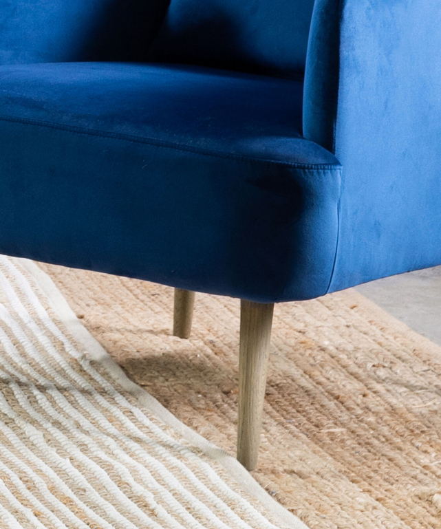 Royal blue store velvet armchair