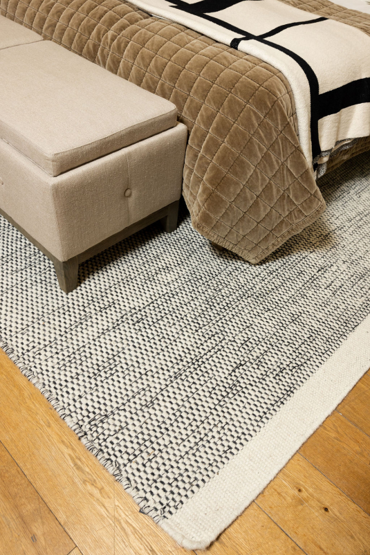Block & Chisel white/black wool rug with white trim