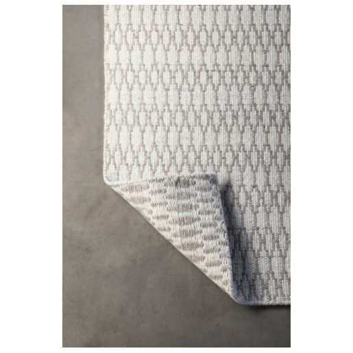 Block & Chisel cream wool rug with diamond detail