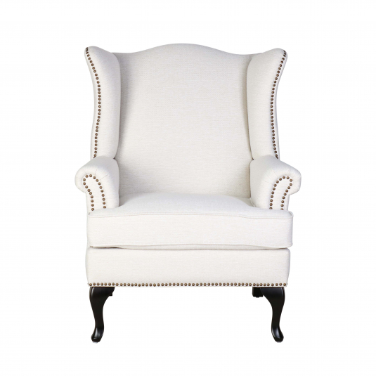upholstered wingback in cream with stud detail 