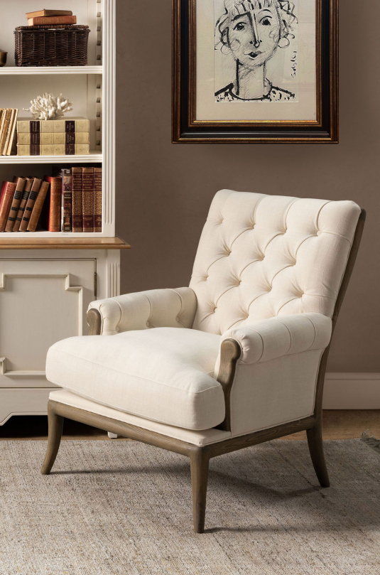 cream upholstered chair with buttoned detail and oak frame Château collection