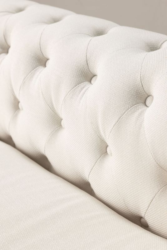 deconstructed chesterfield style sofa with wooden frame