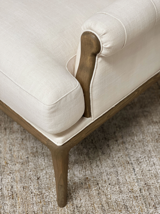 cream upholstered chair with buttoned detail and oak frame Château collection