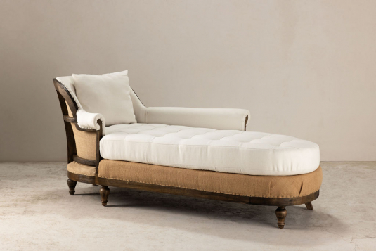 cream upholstered daybed with deconstructed back exposed wooden frame