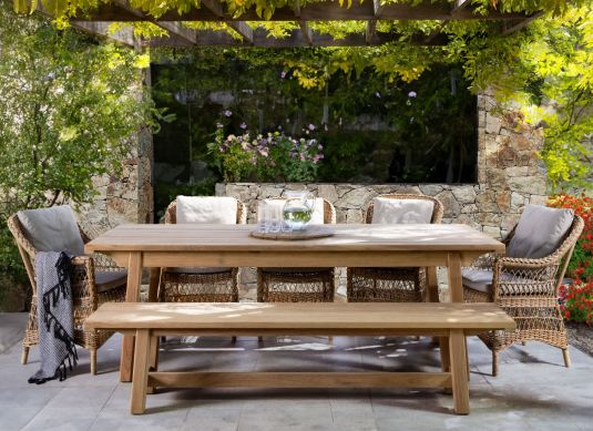 Outdoor armchair in synthetic rattan with cushions