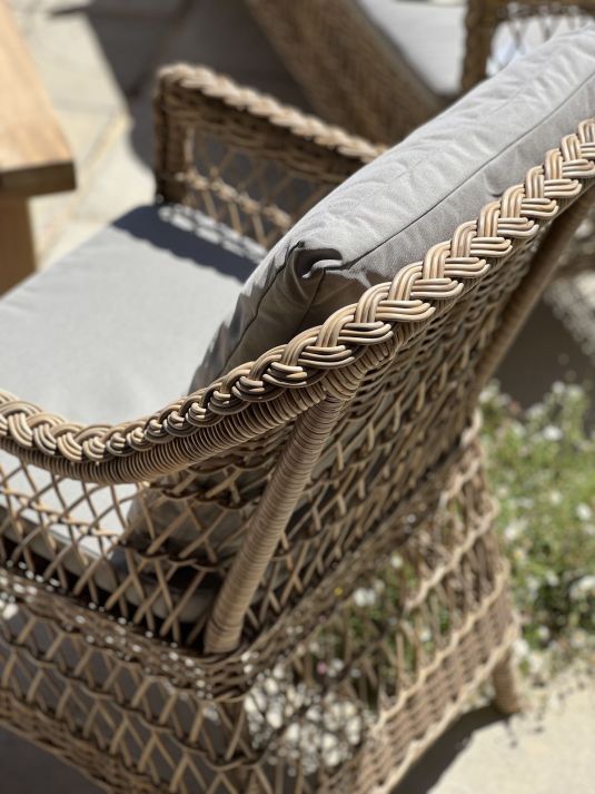 Outdoor armchair in synthetic rattan with cushions