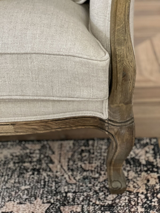 Cream Château style seater with cabriole legs