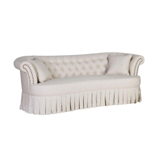 Beige 3 seater sofa with deep buttoned back and pleated skirt detail