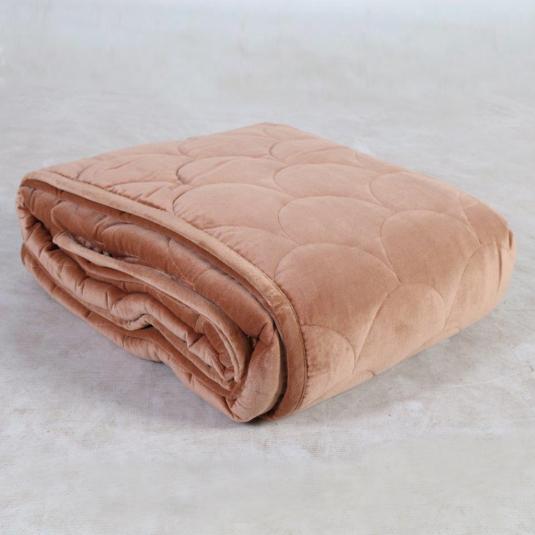 Quilted throw in clay