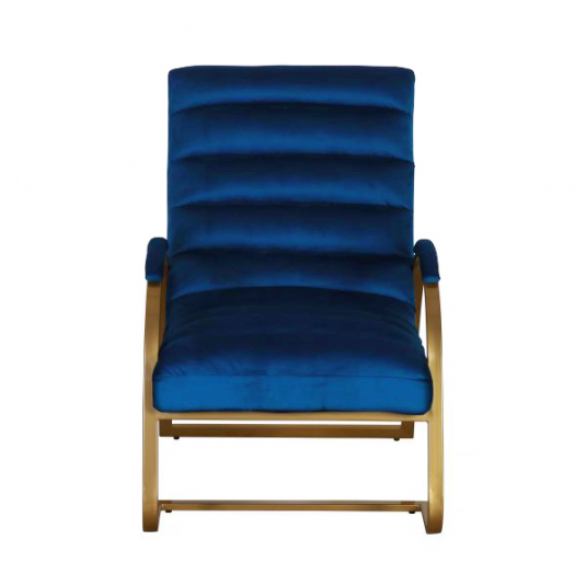 Accent chair with brass frame and navy velvet upholstery 