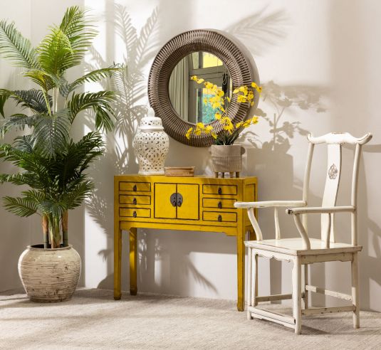 yellow lacquered asian inspired console