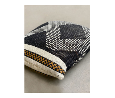 black and white knitted cushion