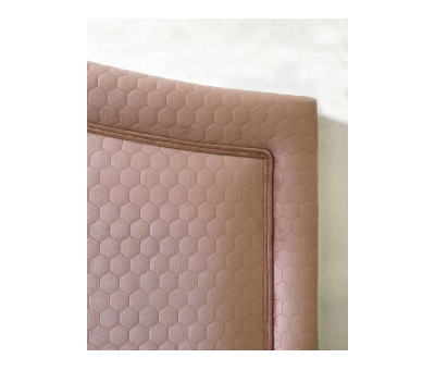 upholstered headboard in rose velvet fabric