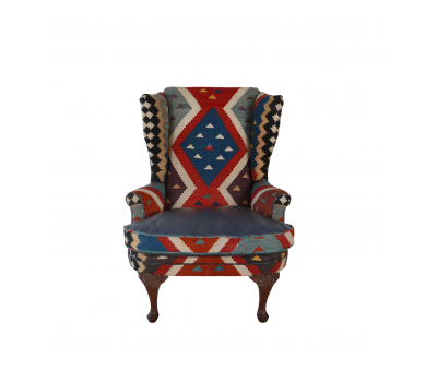 kilim and blue leather upholstered wingback chair 
