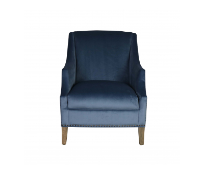 upholstered armchair in blue velvet with stud detail