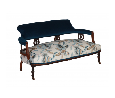 vintage sofa with wooden frame upholstered in blue