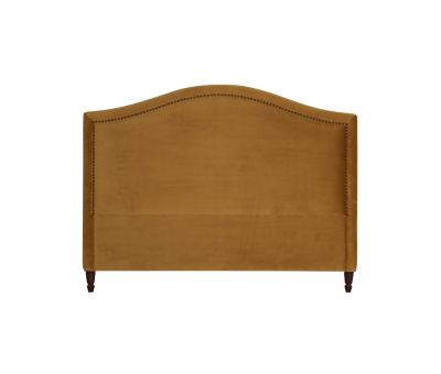 Upholstered gold headboard with stud detail