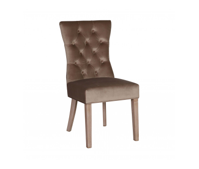 Upholstered brown velvet dining chair with button back detail and wooden legs.