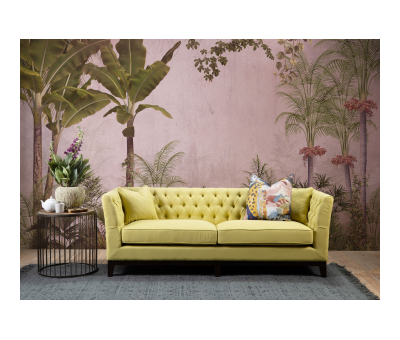yellow upholstered sofa with buttoned back detail