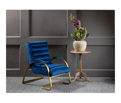 Accent chair with brass frame and navy velvet upholstery 