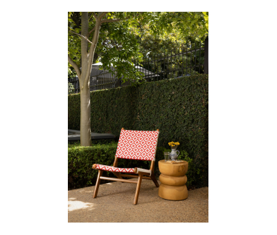 red and white lazy lounge chair with teak frame