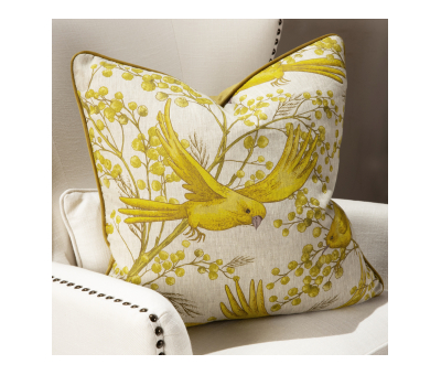 yellow bird cushion with gold velvet backing 