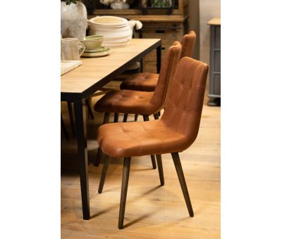 Upholstered chair in brown fabric and tapered wooden legs. 