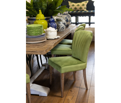 green velvet upholstered dining chair with oak legs