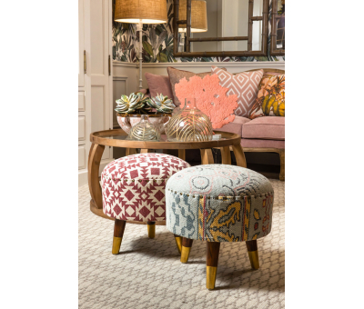 red and white round footstool