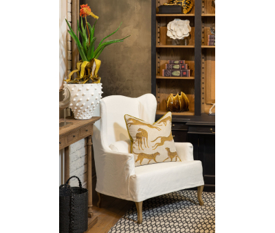 White wingback chair with brown wooden legs Château collection 