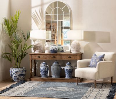 Upholstered armchair with wooden legs linen