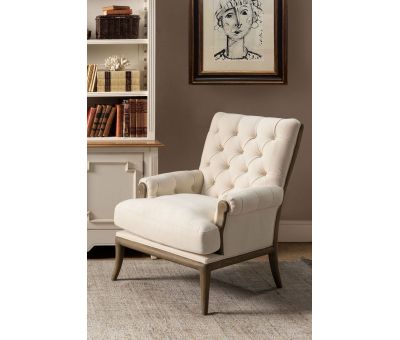 cream upholstered chair with buttoned detail and oak frame Château collection