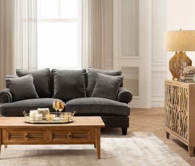 Charcoal velvet sofa with loose back scatter cushions
