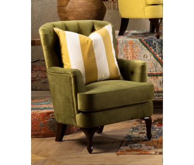 Fully upholstered green velvet chair with deep button back and cabriole leg.