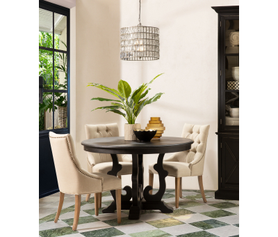 dark wood round dining table with decorative base Château Collection 