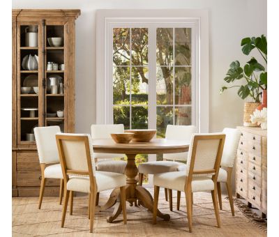 Round dining table in solid weathered oak