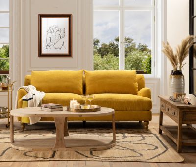 mission sofa in buttercup mustard fabric with wooden legs