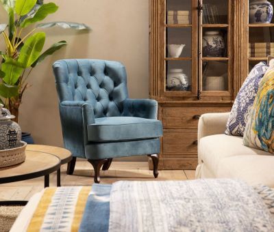 fully upholstered velvet occasional chair in cadet blue 