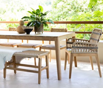 Outdoor dining armchair with teak frame and synthetic rope weave