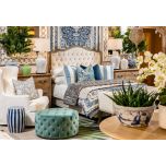 Round deep buttoned ottoman in velvet