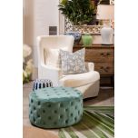 Round deep buttoned ottoman in velvet