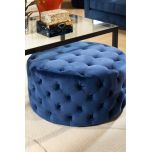 Round deep buttoned ottoman in velvet