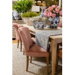 Upholstered dining chair with fan back upholstered detail 