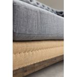 deconstructed chesterfield style sofa with wooden frame