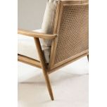 modern armchair with rattan back and linen seat and back cushion